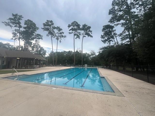 view of swimming pool featuring a patio