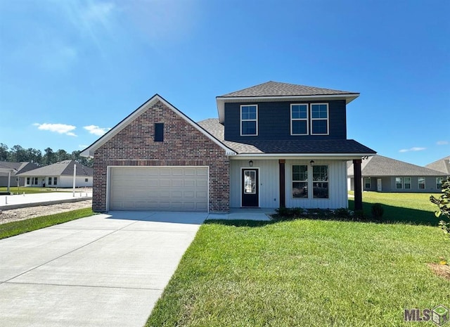 view of property with a front lawn and a garage