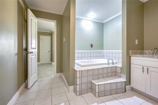 bathroom with vanity, ornamental molding, tile patterned flooring, and tiled tub