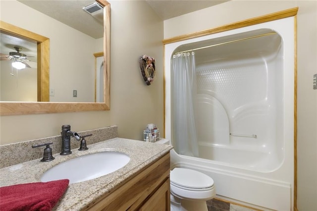 full bathroom with vanity, tile patterned floors, ceiling fan, shower / tub combo, and toilet