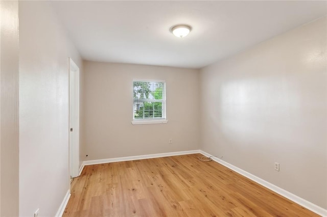 unfurnished room featuring light hardwood / wood-style floors