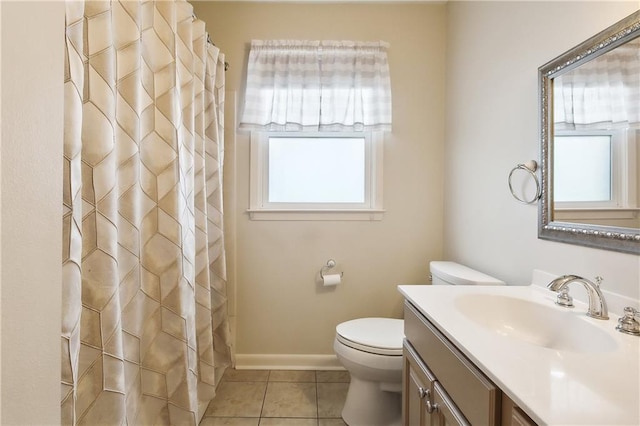 bathroom featuring curtained shower, toilet, vanity, and tile patterned flooring