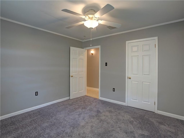 unfurnished bedroom with carpet flooring, ceiling fan, and crown molding