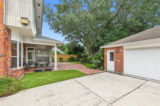 view of patio / terrace with a garage