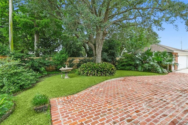 view of yard with a garage