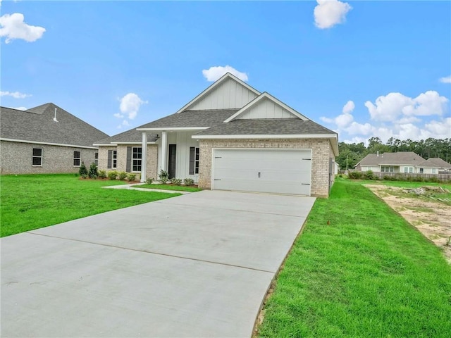 view of front of home featuring a garage and a front yard