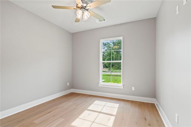 unfurnished room featuring ceiling fan and light hardwood / wood-style floors