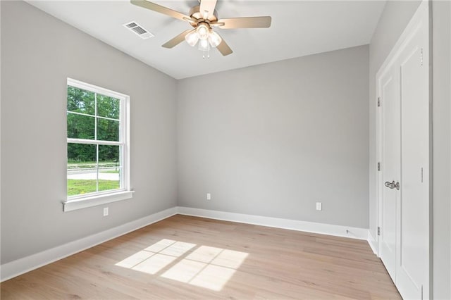 unfurnished bedroom featuring ceiling fan and light wood-type flooring