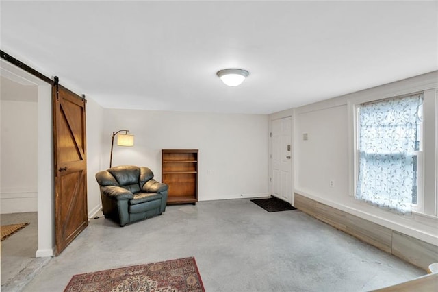 sitting room with a barn door