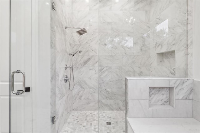 bathroom with an enclosed shower