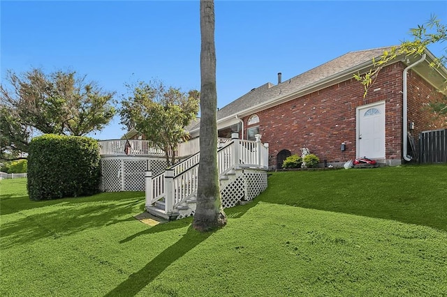 view of yard with a deck