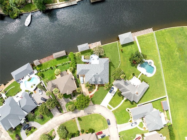 bird's eye view with a water view