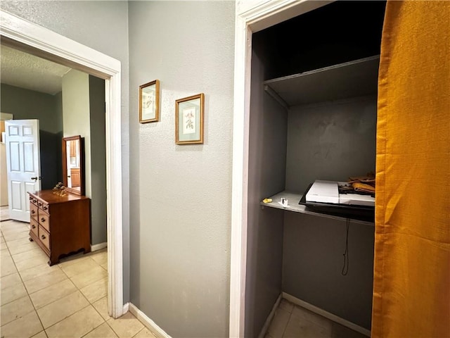 interior space with light tile patterned floors