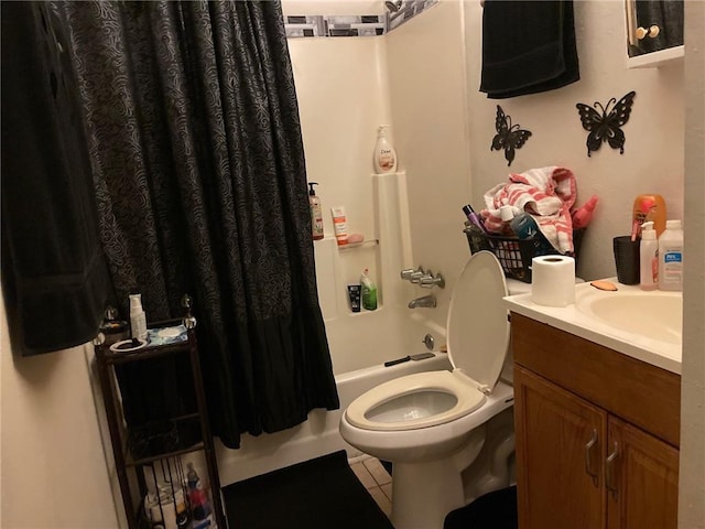 full bathroom featuring vanity, toilet, tile patterned floors, and shower / bath combination with curtain