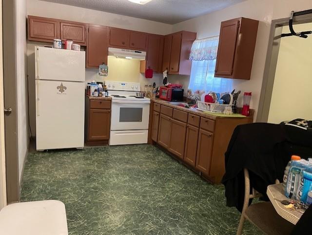 kitchen with white appliances