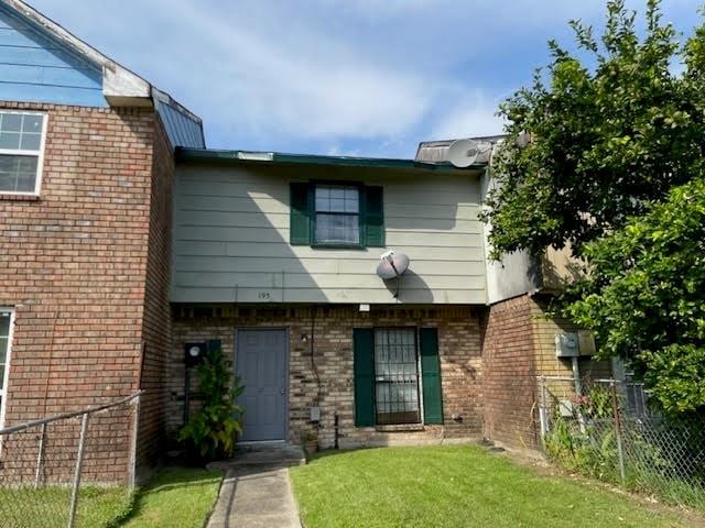 exterior space with a front yard