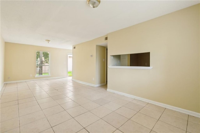 view of tiled spare room