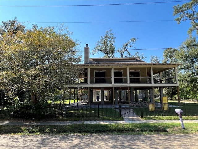 view of front facade featuring a balcony