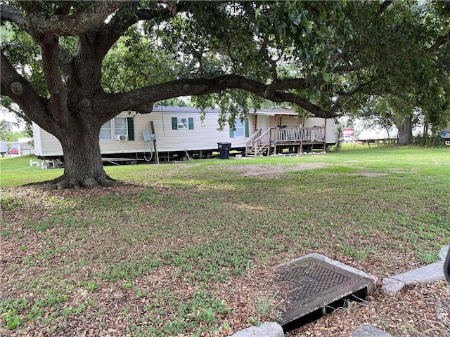 view of yard with a deck