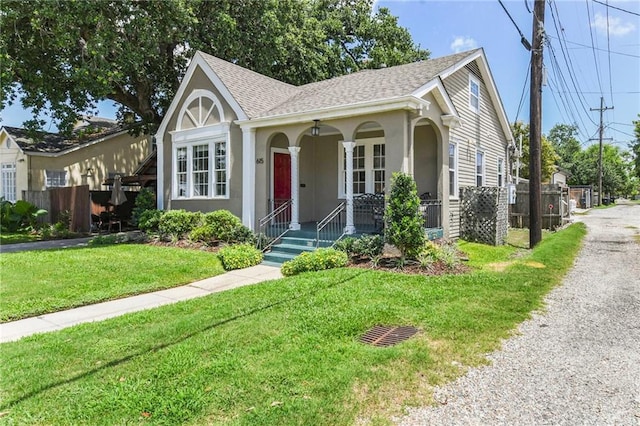 view of front of home with a front lawn