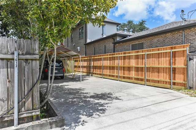 view of patio featuring a carport