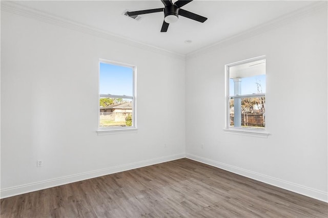 718 W Dr, Westwego, LA 70094 - unfurnished room with wood finished floors, crown molding, and ceiling fan