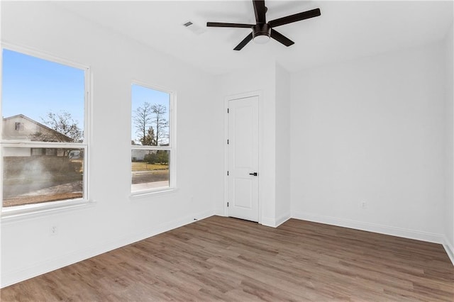 718 W Dr, Westwego, LA 70094 - unfurnished room featuring wood finished floors and a ceiling fan