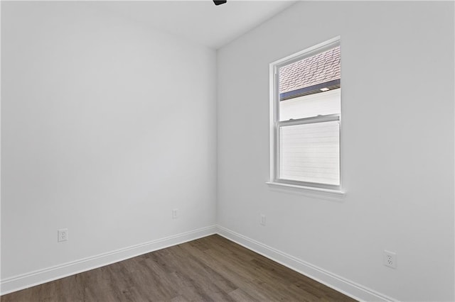 718 W Dr, Westwego, LA 70094 - spare room with dark wood finished floors and ceiling fan