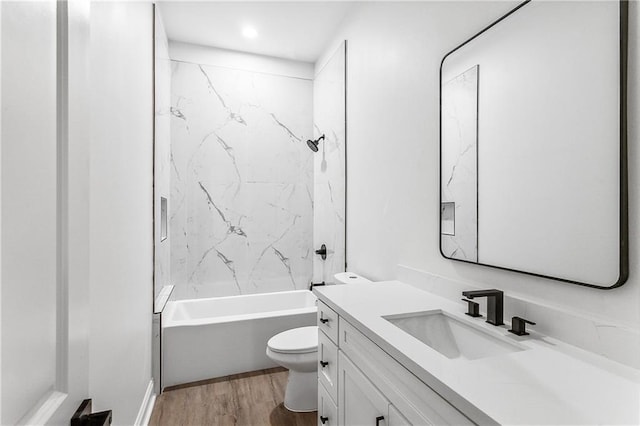 718 W Dr, Westwego, LA 70094 - full bathroom with vanity, wood finished floors, shower / bath combination, and recessed lighting