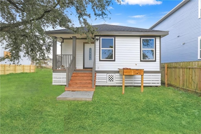 view of front of property with a front lawn