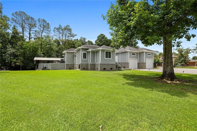 31753 River Pines Dr, Springfield, LA 70462 - view of front of property featuring a front yard and a garage