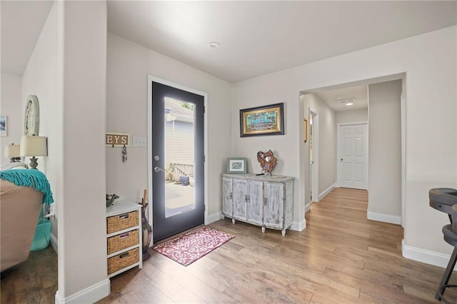 entrance foyer featuring light hardwood / wood-style floors