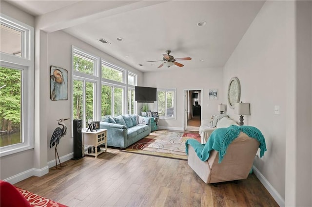 31753 River Pines Dr, Springfield, LA 70462 - living area with wood-type flooring, baseboards, ceiling fan, and visible vents