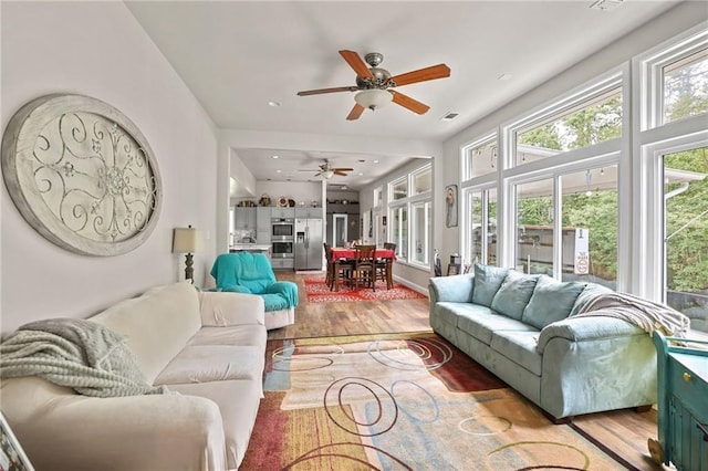 31753 River Pines Dr, Springfield, LA 70462 - living area featuring visible vents, a ceiling fan, wood finished floors, and recessed lighting