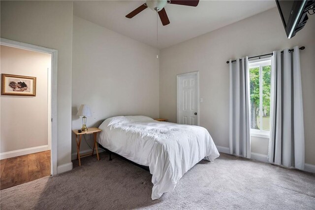 31753 River Pines Dr, Springfield, LA 70462 - bedroom featuring baseboards, a ceiling fan, and carpet flooring