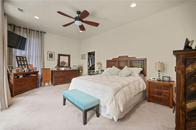 31753 River Pines Dr, Springfield, LA 70462 - bedroom featuring light carpet, recessed lighting, a closet, and a walk in closet