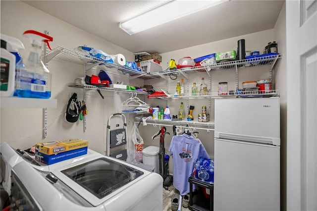 31753 River Pines Dr, Springfield, LA 70462 - clothes washing area with washer and clothes dryer and laundry area
