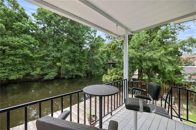 31753 River Pines Dr, Springfield, LA 70462 - wooden deck featuring a water view