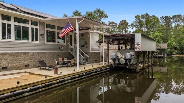 31753 River Pines Dr, Springfield, LA 70462 - view of dock featuring boat lift