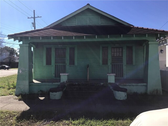 bungalow-style home featuring a porch