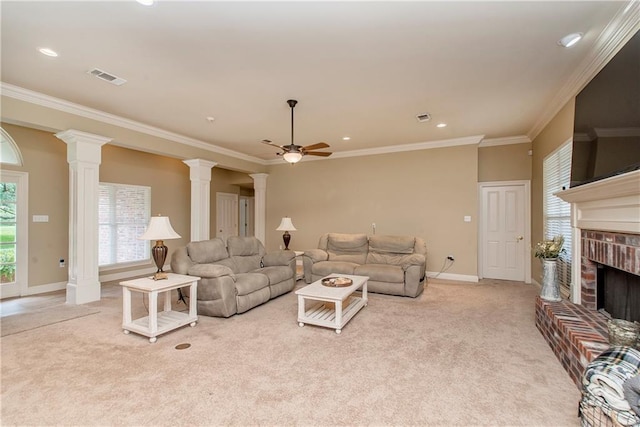 living room with crown molding, light carpet, a brick fireplace, and ceiling fan