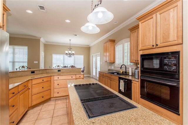 kitchen with light tile patterned flooring, an inviting chandelier, black appliances, pendant lighting, and sink