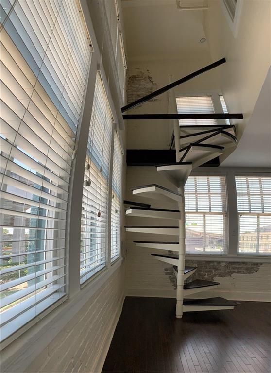 staircase featuring hardwood / wood-style floors