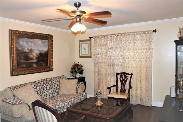 living room featuring ornamental molding, hardwood / wood-style flooring, and ceiling fan