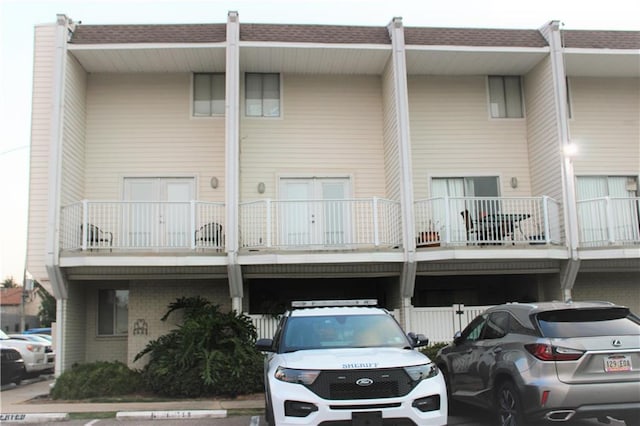 3805 Houma Blvd Unit C201, Metairie, LA 70006 - view of property featuring uncovered parking