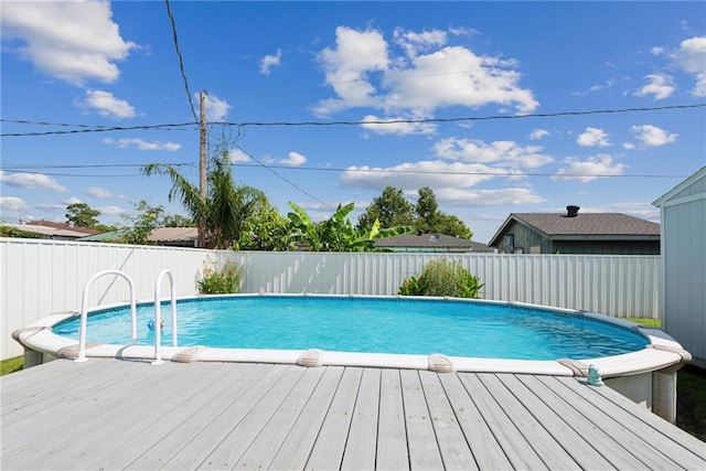 view of pool featuring a wooden deck