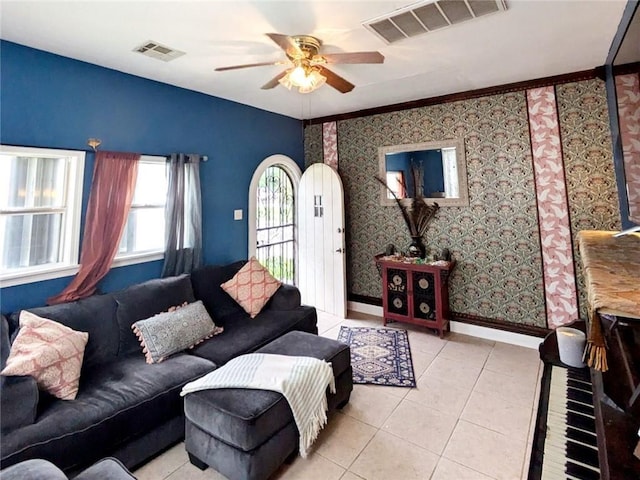 living room featuring ceiling fan and light tile patterned floors