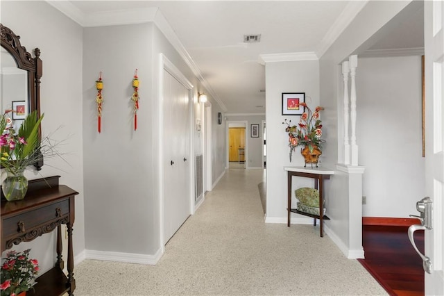 corridor with crown molding and decorative columns