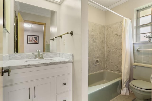 bathroom featuring crown molding, tile walls, toilet, shower / tub combo, and vanity