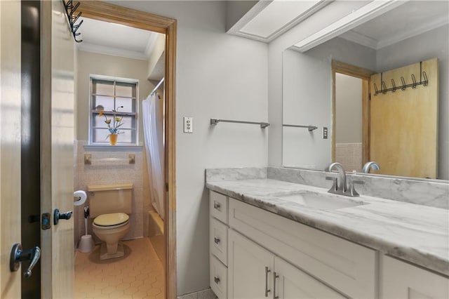 full bath with toilet, tile patterned flooring, crown molding, and vanity